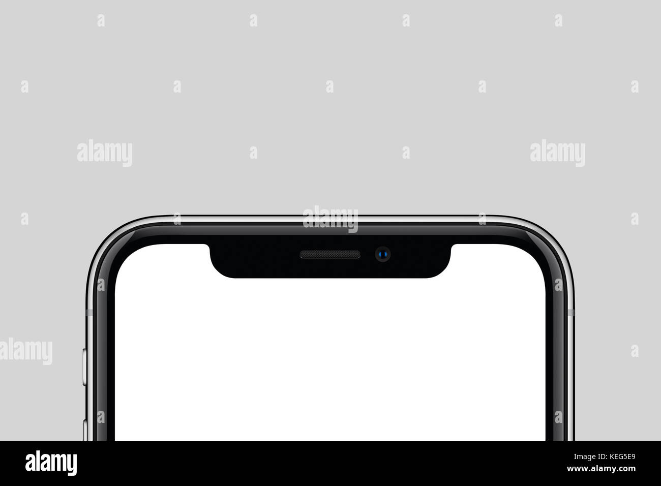 Close-up moderno smartphone nuevo boceto similar al iPhone X con copia espacio sobre fondo gris. Foto de stock
