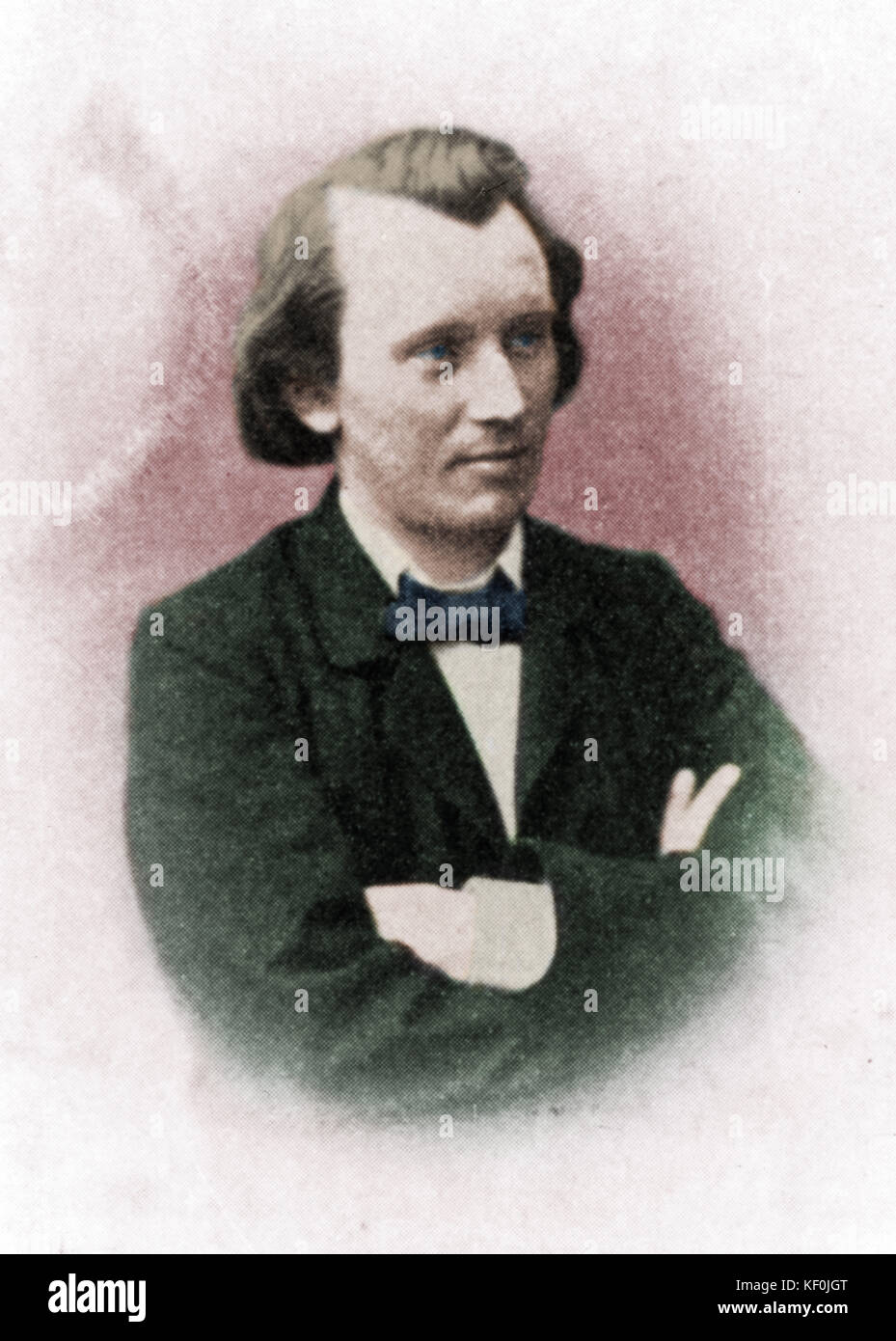 BRAHMS, Johannes como joven con los brazos plegados. Compositor alemán, el 7 de mayo de 1833 - 3 de abril de 1897. Colourised versión. Foto de stock