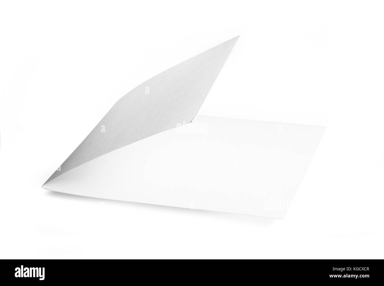 Folleto en blanco sobre fondo blanco aisladas con trazado de recorte. Foto de stock