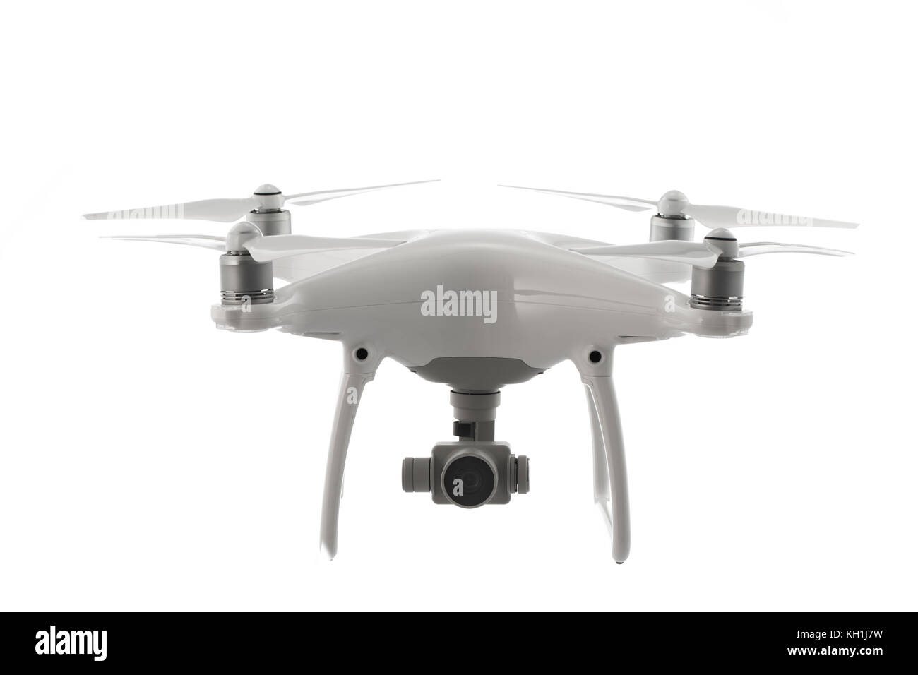 Flying drone quadcopter aislado en blanco Foto de stock