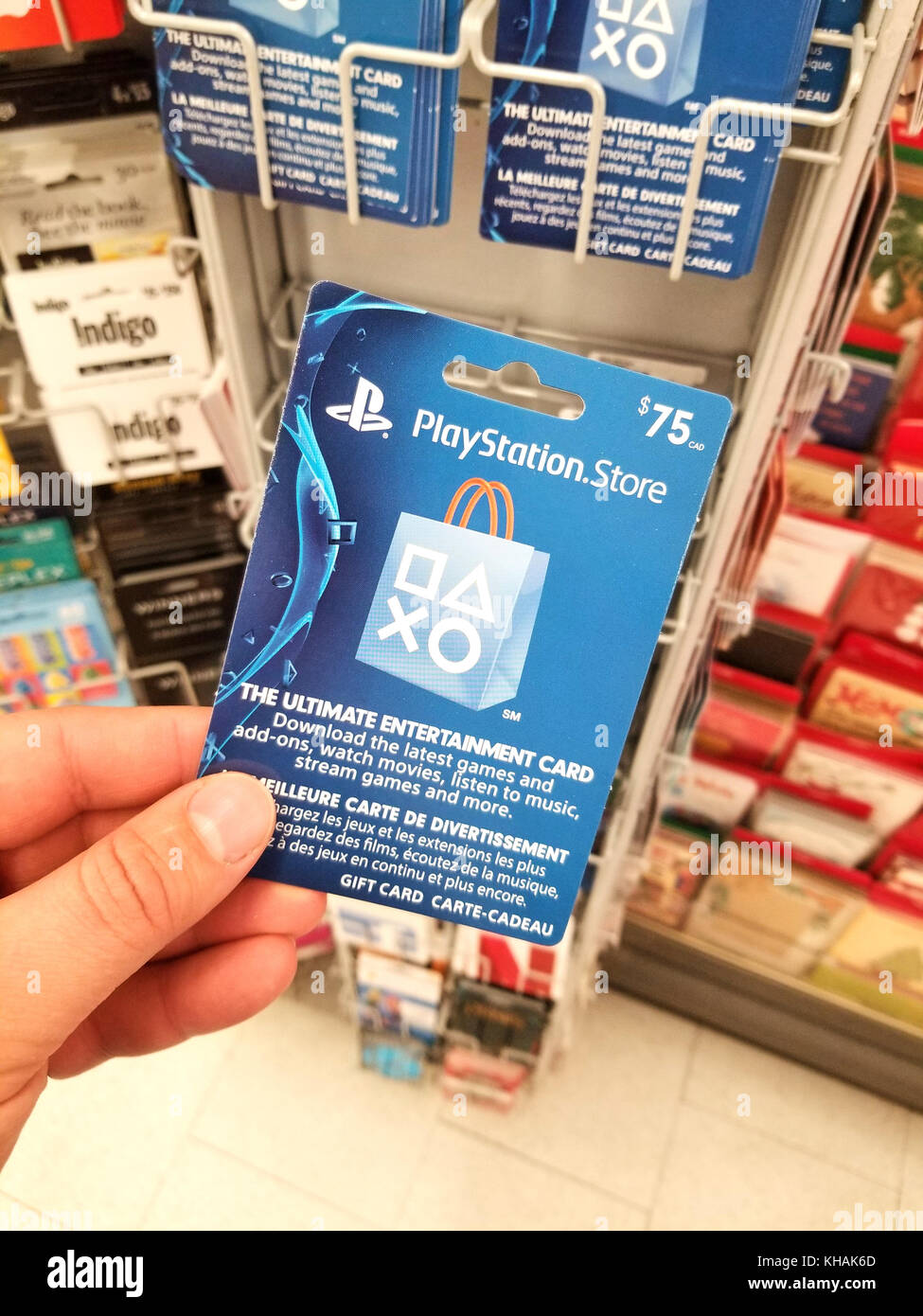 Montreal, Canadá - 7 de noviembre de 2017: playstation tarjeta de regalo juegos PLAYSTATION es una marca que se compone de cuatro home consolas de video juegos, así como un Foto de stock
