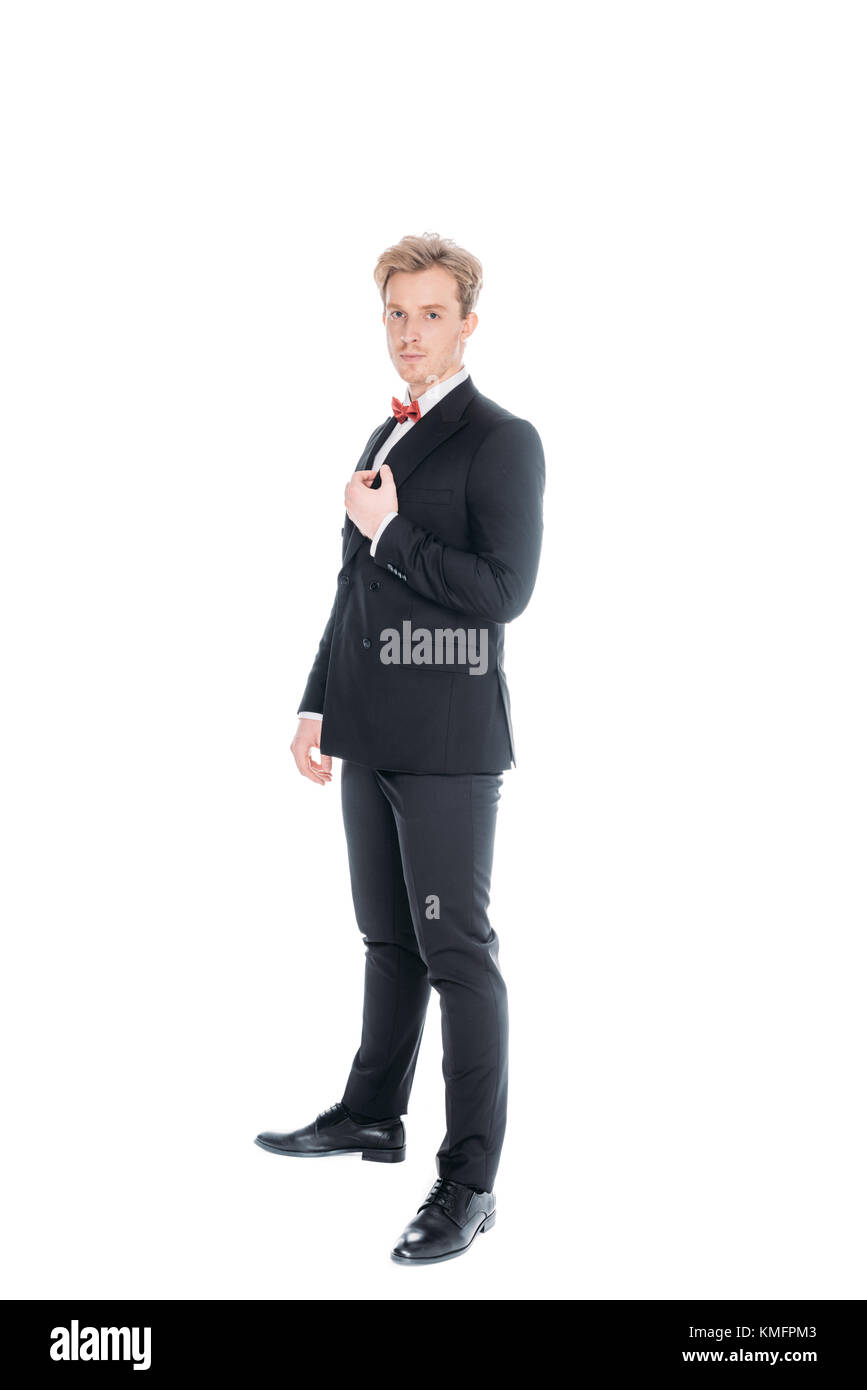 Hombre elegante en traje y pajarita Foto de stock
