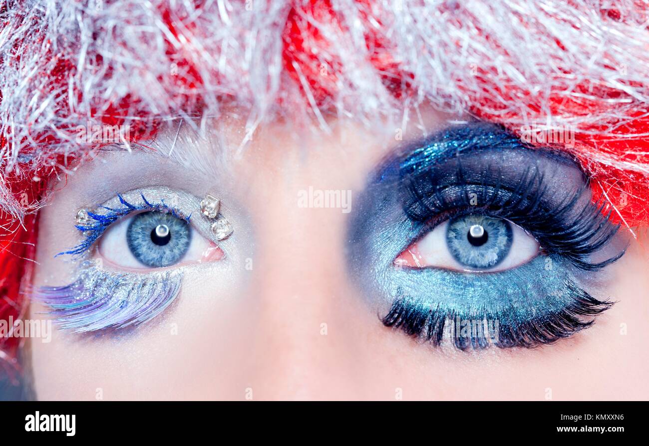 Concepto de navidad asimétricos maquillaje invierno rojo plata closeup  macro Fotografía de stock - Alamy