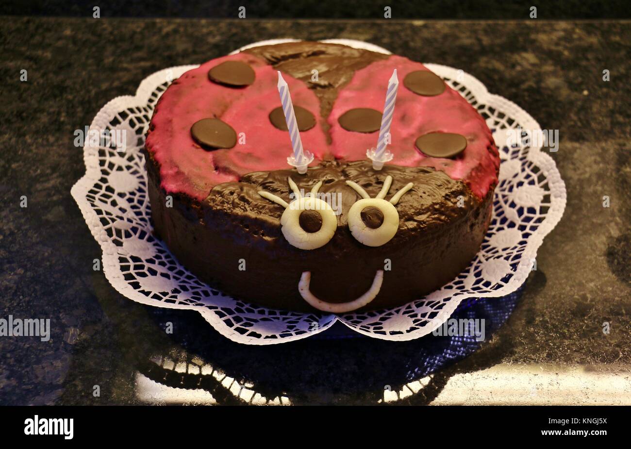 Mariquita como un pastel de cumpleaños para niños Foto de stock