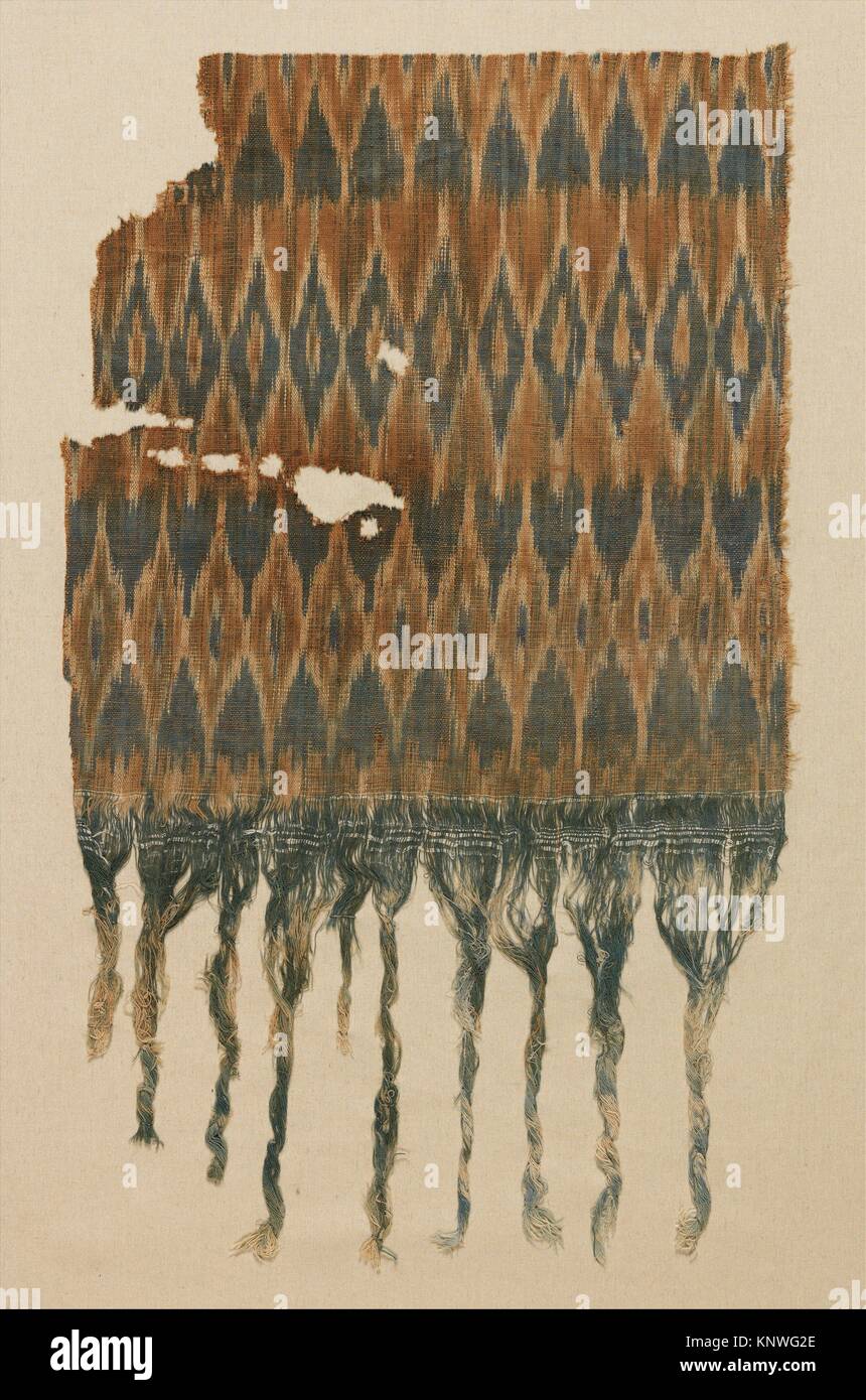 Fragmento. Fecha: 10th century; Geografía: atribuido a Yemen; Media: Algodón; ligamento tafetán, resistir teñidos (ikat), bordados; Dimensiones: H. 15 1/2 in. Foto de stock