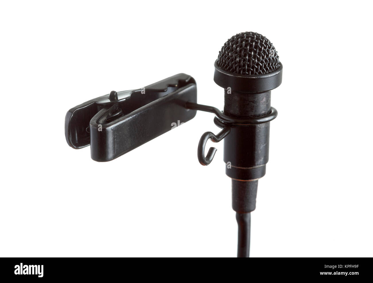 Primer plano de un micrófono clip de corbata con un fondo blanco. Foto de stock