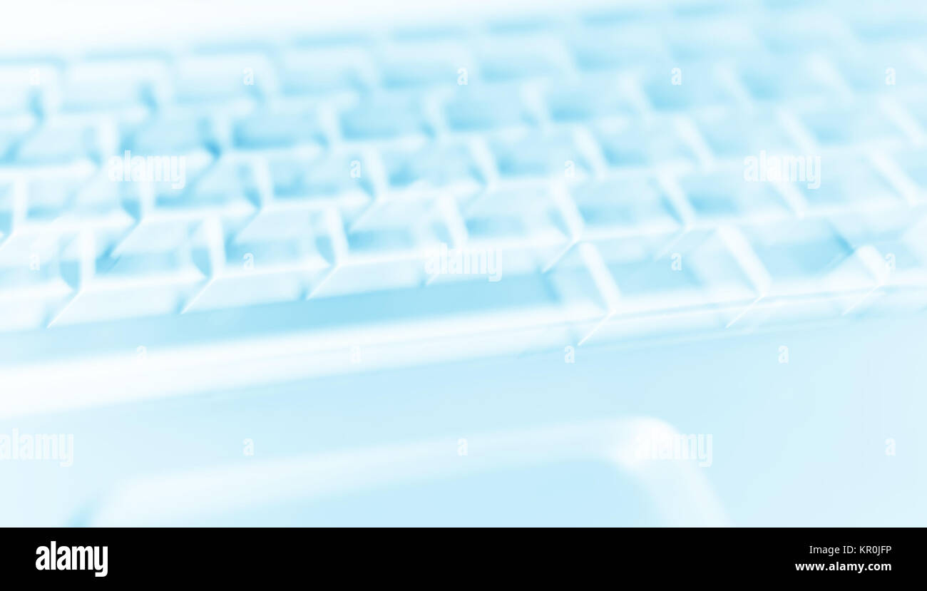 Diagonal teclado portátil bokeh de fondo cian Fotografía de stock - Alamy