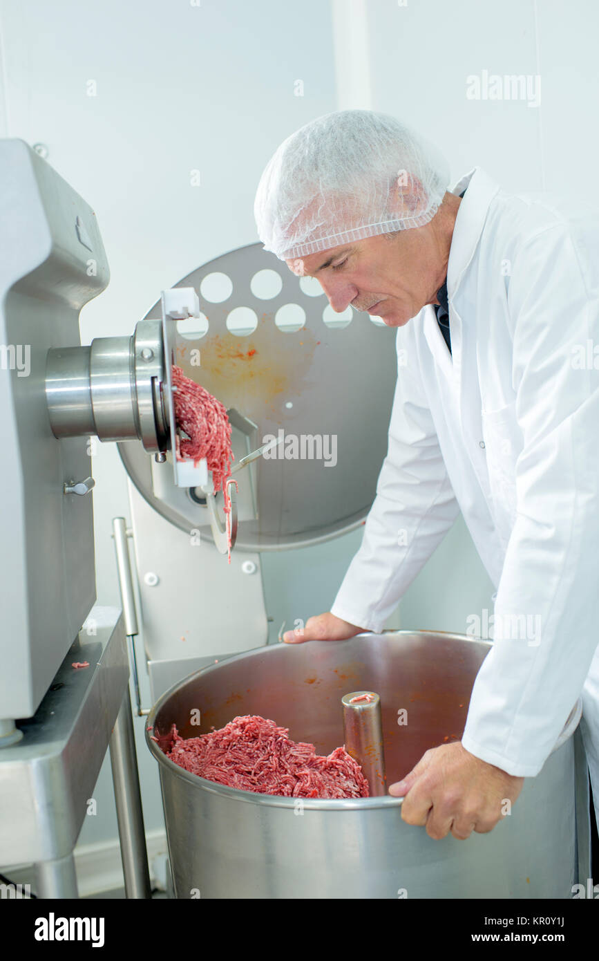 Picadora de carne industrial fotografías e imágenes de alta