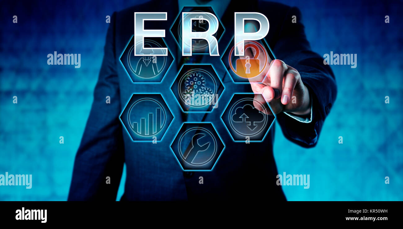 Business Manager En traje azul empujando ERP Foto de stock