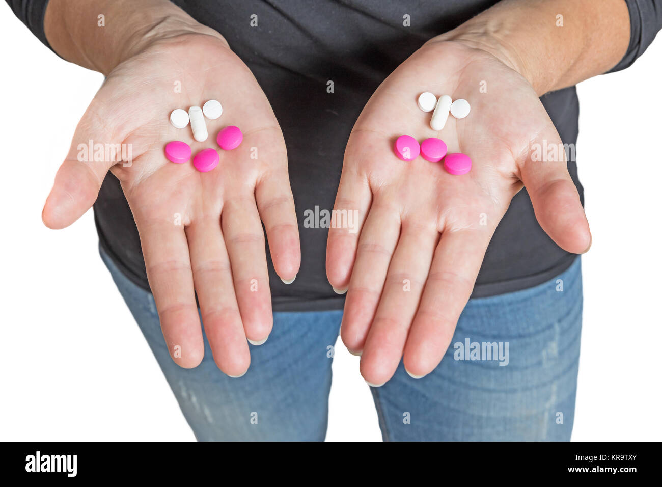 Mono tenis resultado Símbolos de buenas y malas drogas en manos de mujer Fotografía de stock -  Alamy