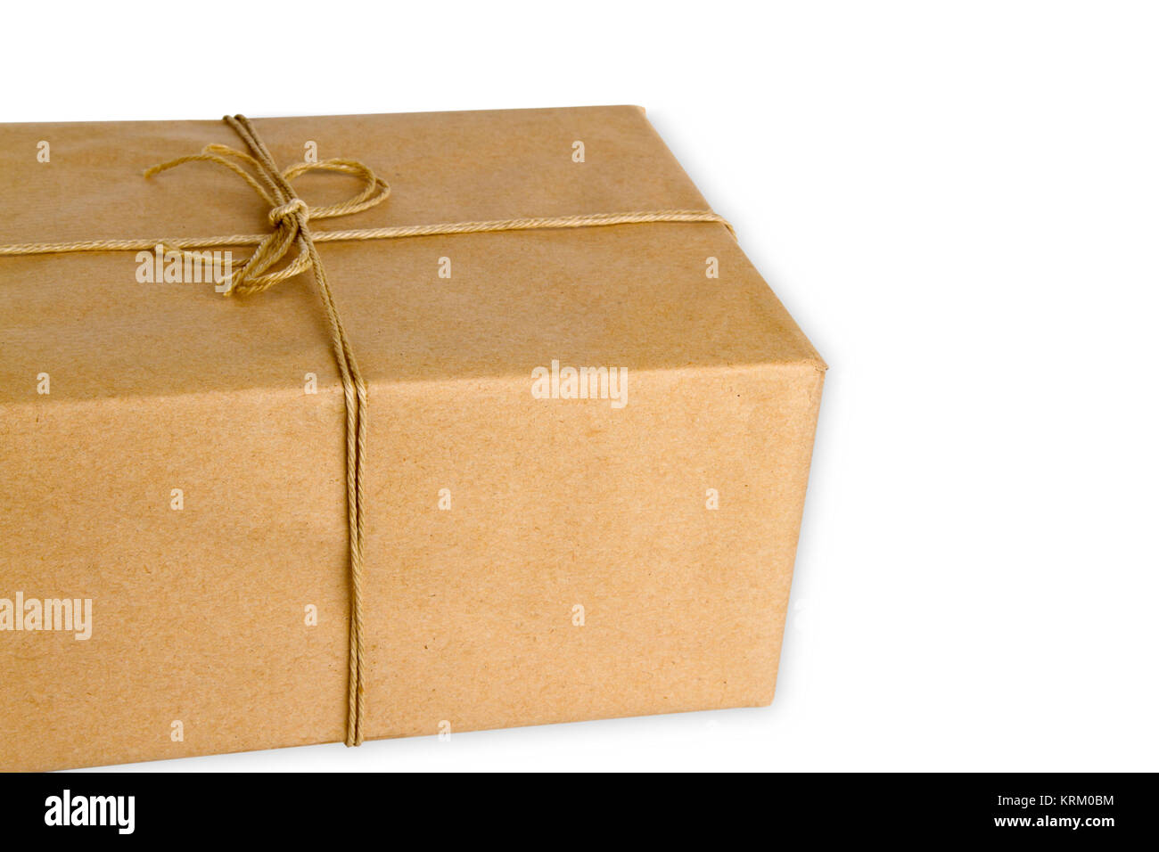 Braunes Paket freigestellt auf weissem Hintergrund Foto de stock