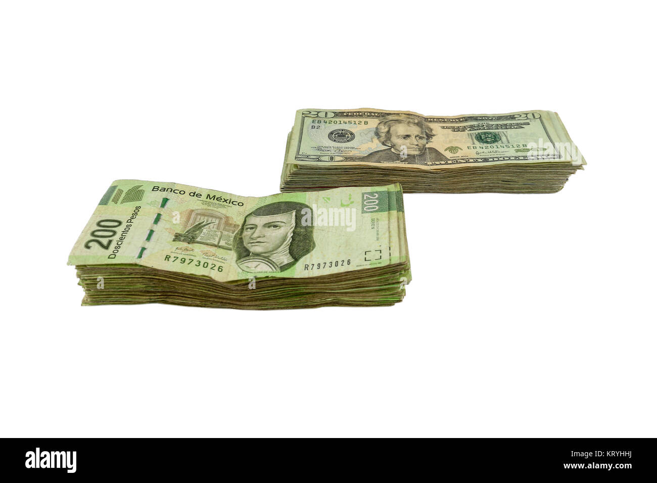 Una pila de billetes de dólares y Pesos Mexicanos facturas Fotografía de  stock - Alamy