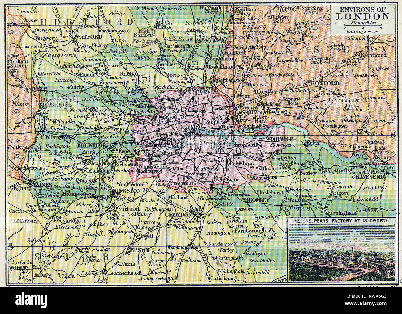 Un mapa de color de Londres, alrededores y ciudades y de las aldeas circundantes en 1923 con un anuncio de jabón de pera mostrando su fábrica en Islington y las principales líneas de ferrocarril y carreteras. Foto de stock