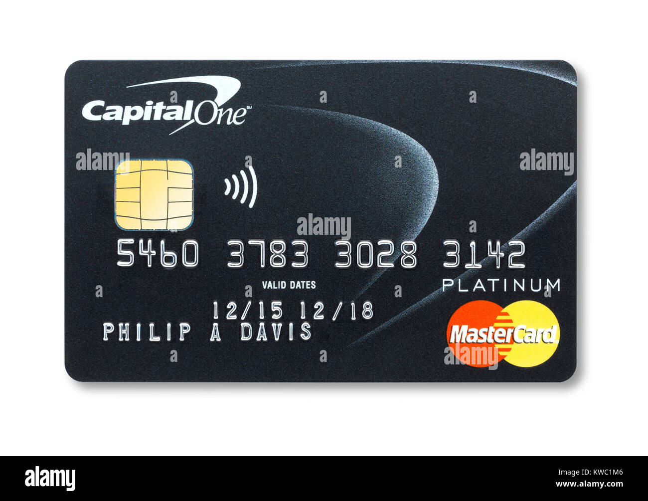 Corte simple de una tarjeta de crédito de Capital One con la celebración de la sombra Foto de stock