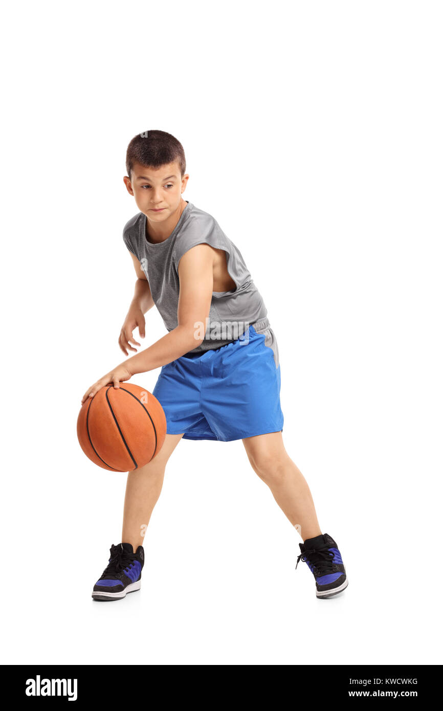 Boy dribbling basketball fotografías e imágenes de alta resolución - Alamy