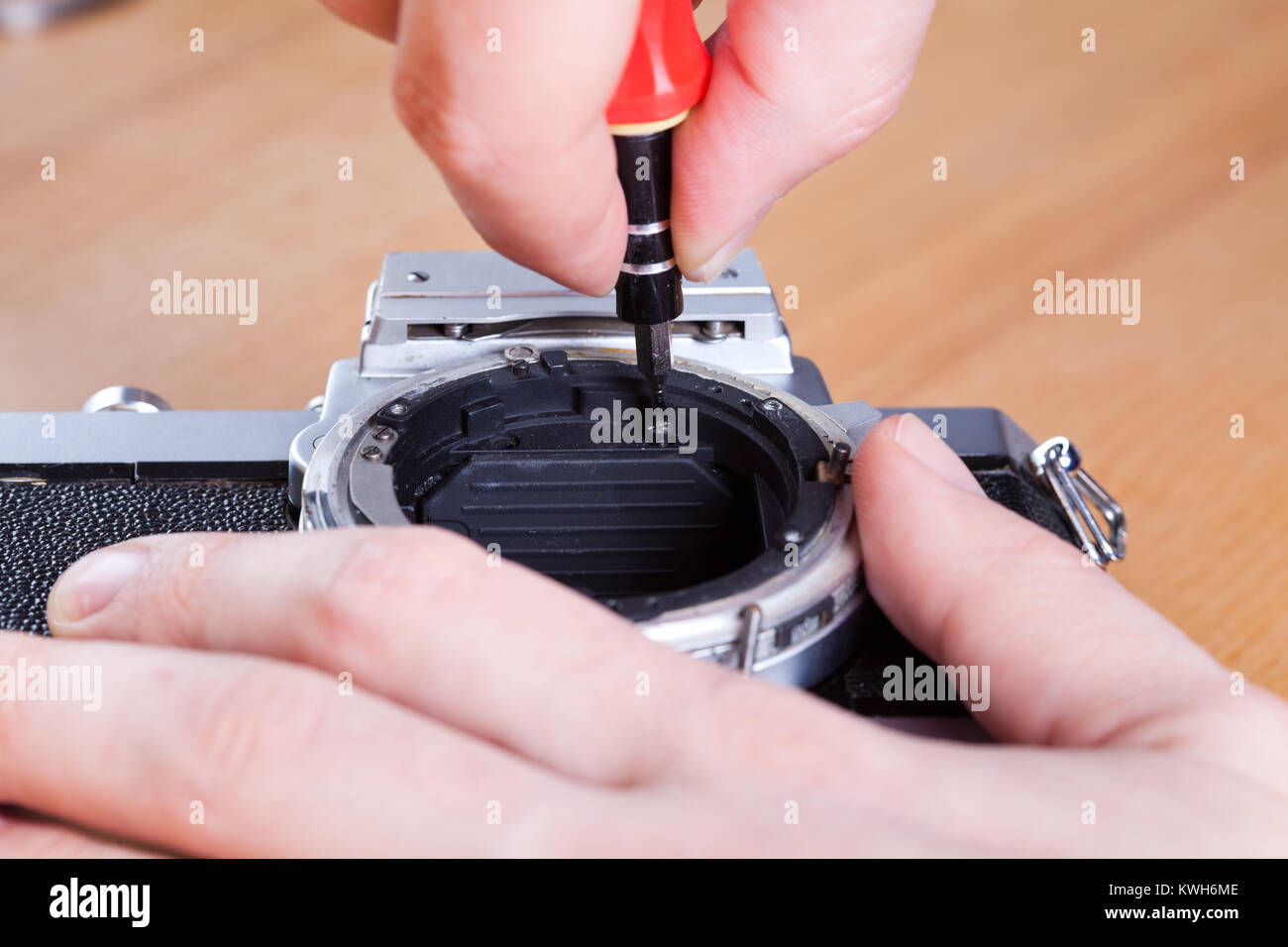 Reparación técnico cámara de fotos antiguas Fotografía de stock - Alamy
