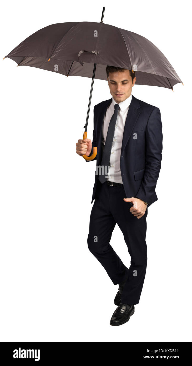 El empresario y el paraguas aislado sobre fondo blanco. Foto de stock
