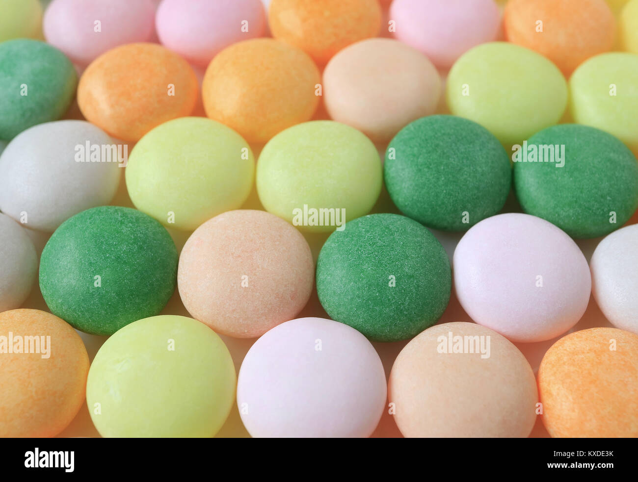 Close-up de dulces redondos de color pastel, la textura de fondo Fotografía  de stock - Alamy