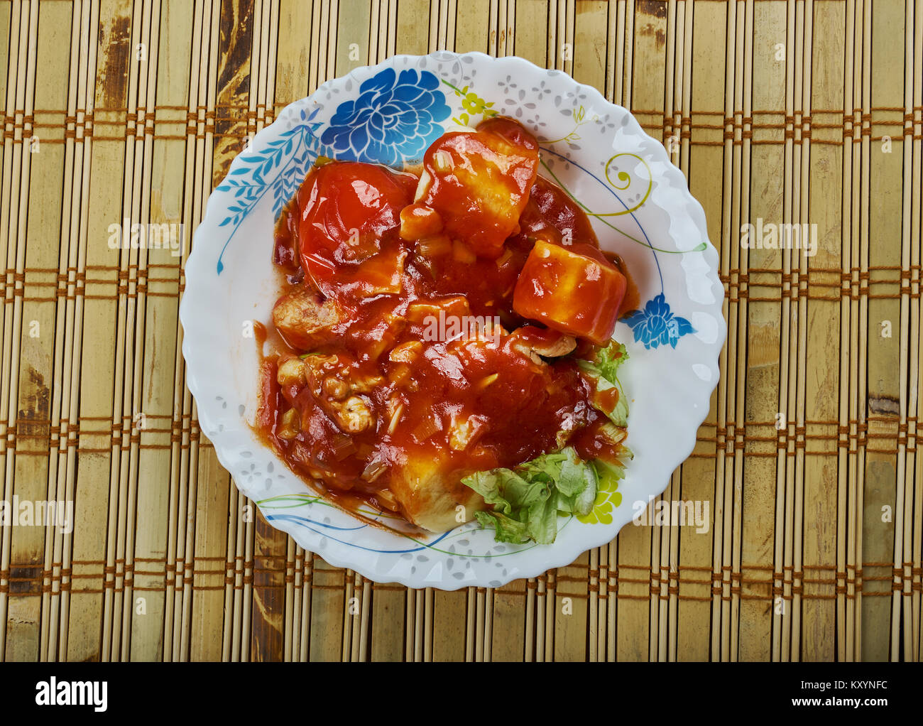 Pollo en Manchamanteles - en cocina mexicana, es un guiso de carnes  variadas, pimientos, verduras y frutas Fotografía de stock - Alamy