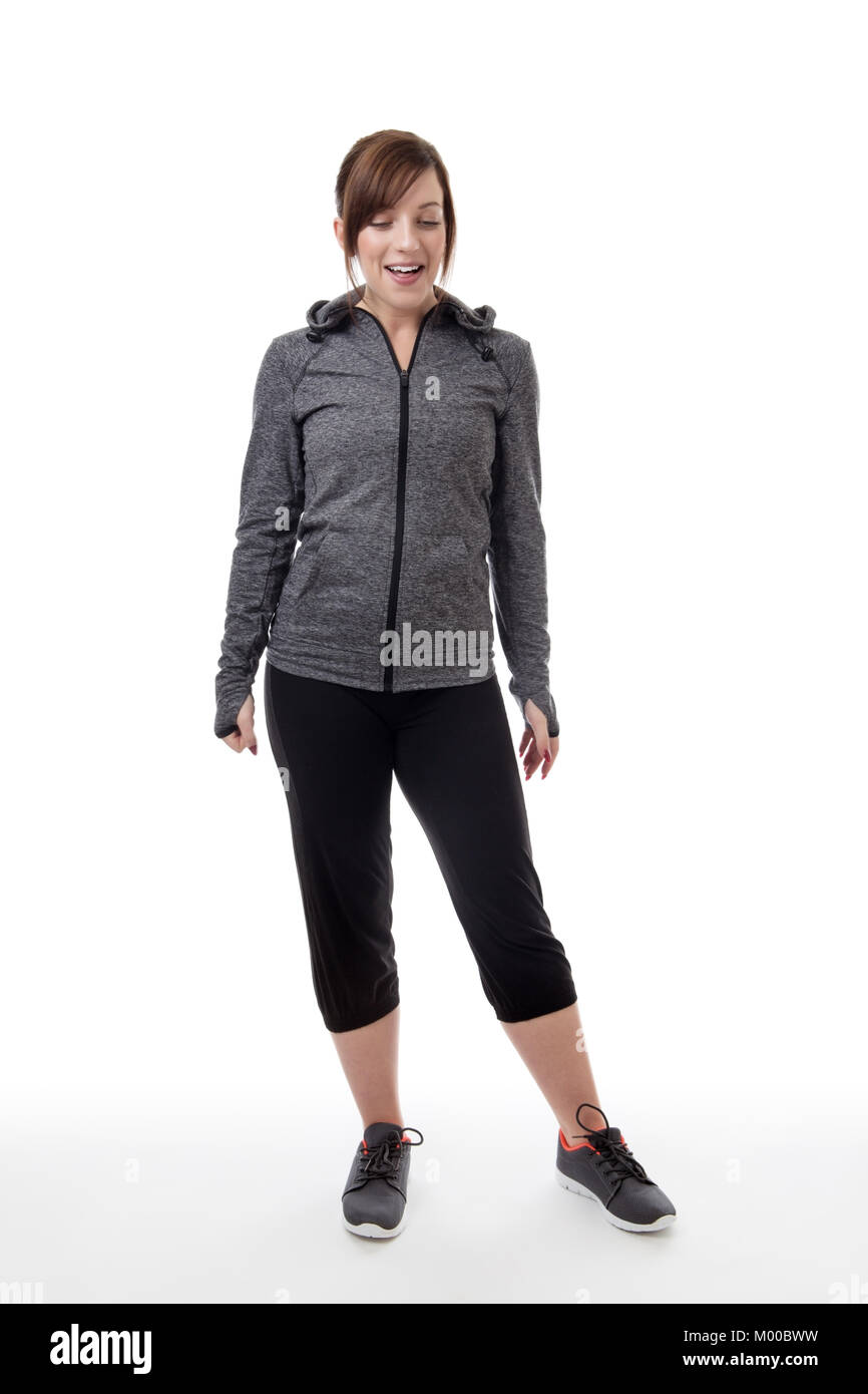 Feliz mujer vistiendo un chándal fitness Fotografía de stock - Alamy