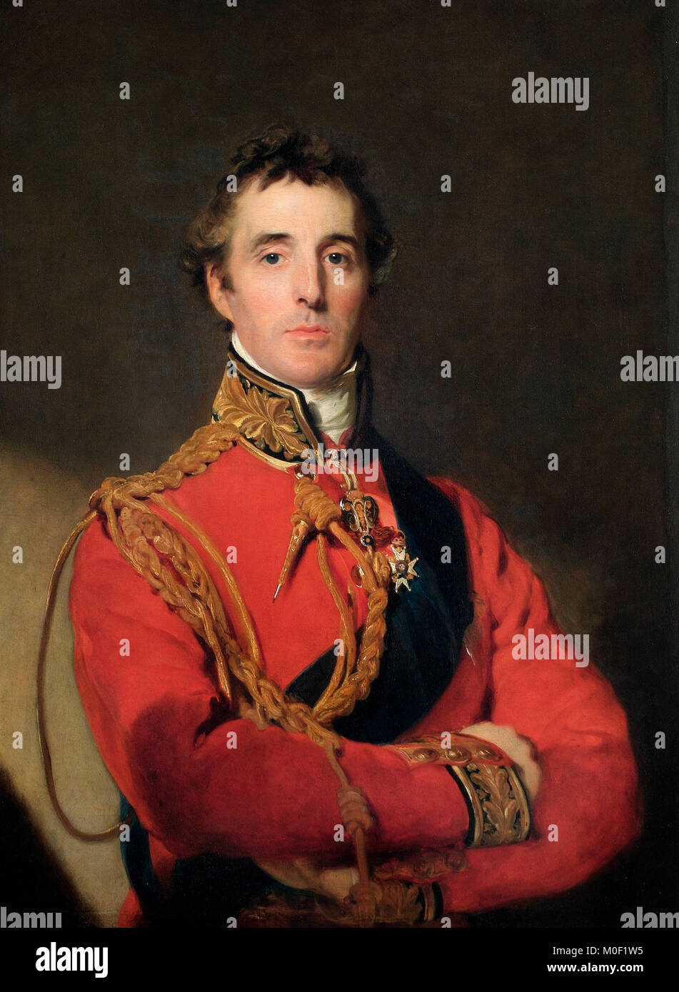 Arthur Wellesley, primer duque de Wellington (1769â€"1852) El Duque de Wellington está de pie en la mitad de la longitud del campo, vistiendo Marshalâ€™s uniforme, con la Liga de estrellas y la guillotina, la insignia del Toisón de Oro, y una insignia especial ordenada por el príncipe regente para ser usado desde 1815 por los Caballeros de Gran Cruz de la División Militar de la orden del baño que también eran Caballeros Companion de la orden de la Liga. Thomas Lawrence, circa 1816 Foto de stock