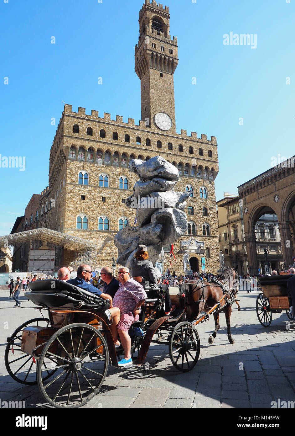 Caballo carriagein turística ciudad vieja, Palazzo Vecchio, Florencia Toscana Italia Europa central, Foto de stock
