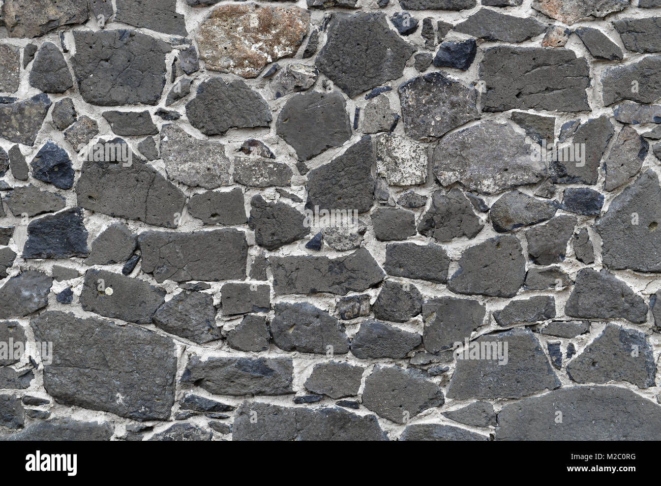 Disparo de fotograma completo de muro de piedra de un edificio tradicional. Foto de stock