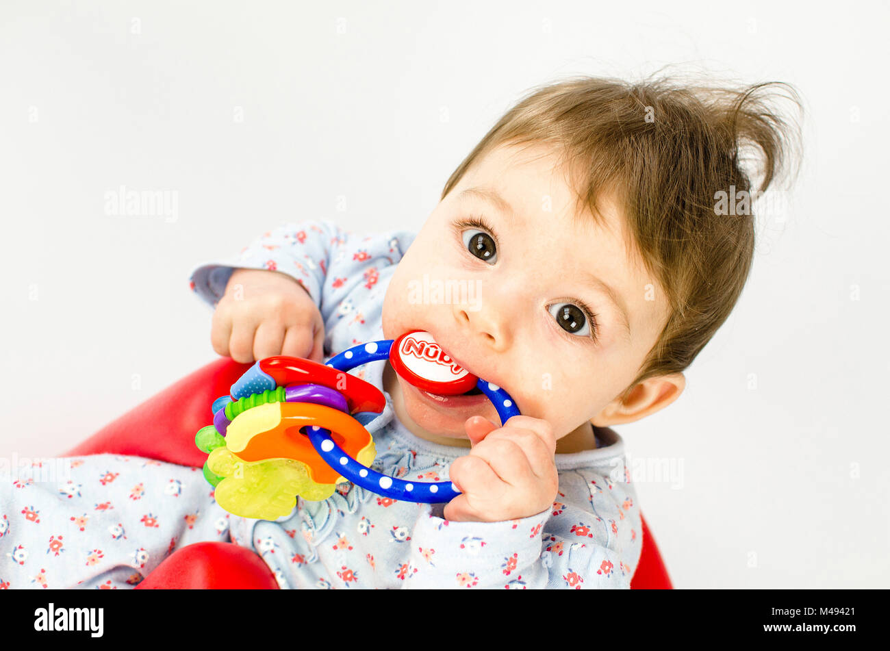 La dentición baby girl Foto de stock