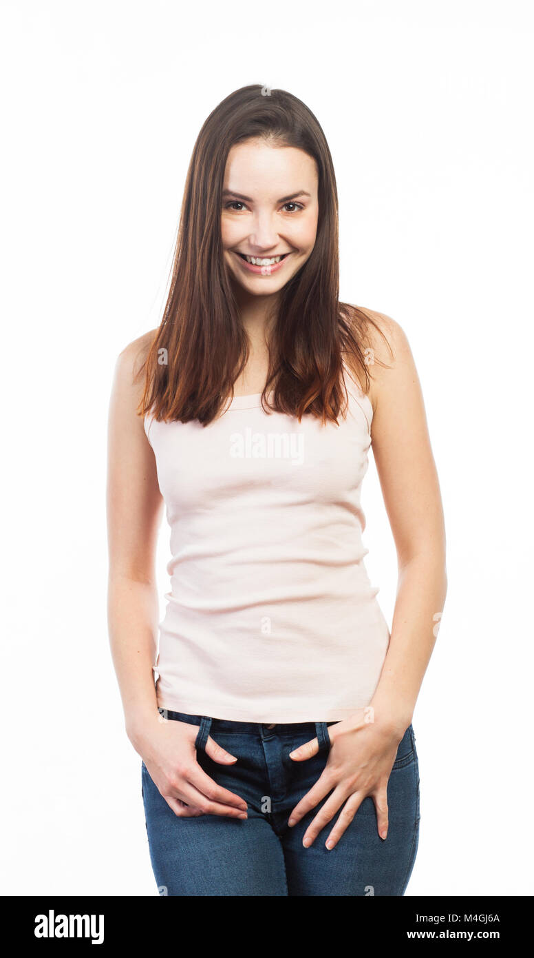 Retrato de una joven mujer sonriente, aislado en blanco Foto de stock