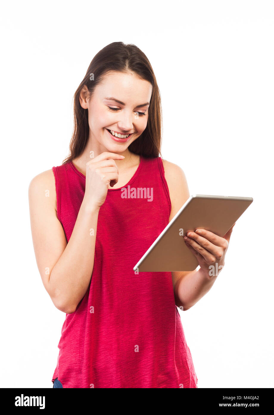 Pretty Woman utilizando una tableta electrónica, el concepto de comunicación, aislado en blanco Foto de stock