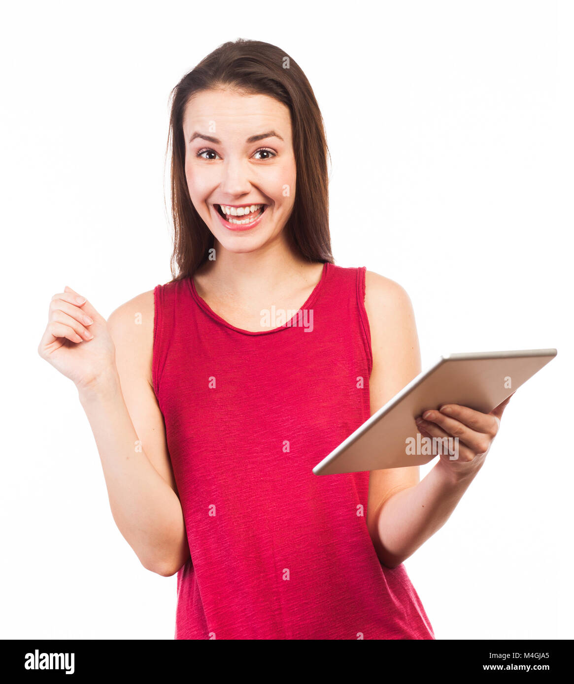 Alegre Pretty Woman utilizando una tableta electrónica, el concepto de comunicación, aislado en blanco Foto de stock