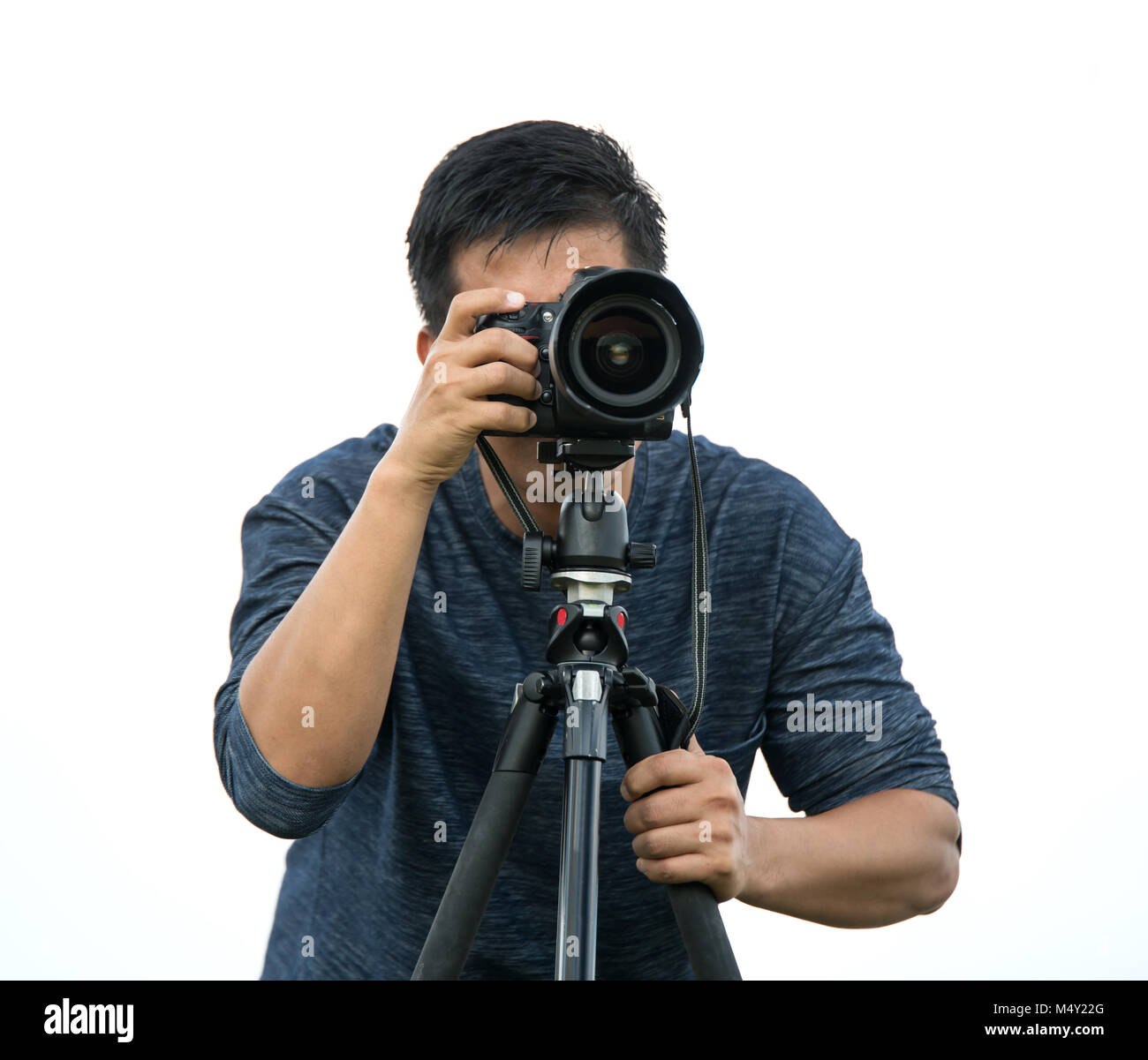 Viajes profesionales en la ubicación y el camarógrafo/fotógrafo de la naturaleza (hombre) fotografía de la naturaleza Foto de stock