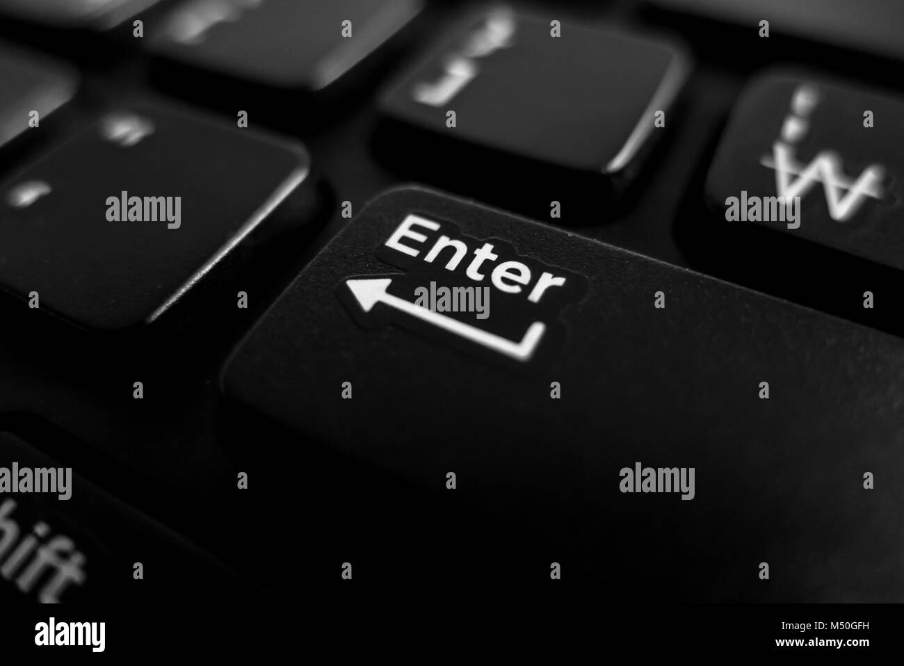 Cerrar el foco de teclado tecla enter Fotografía de stock - Alamy