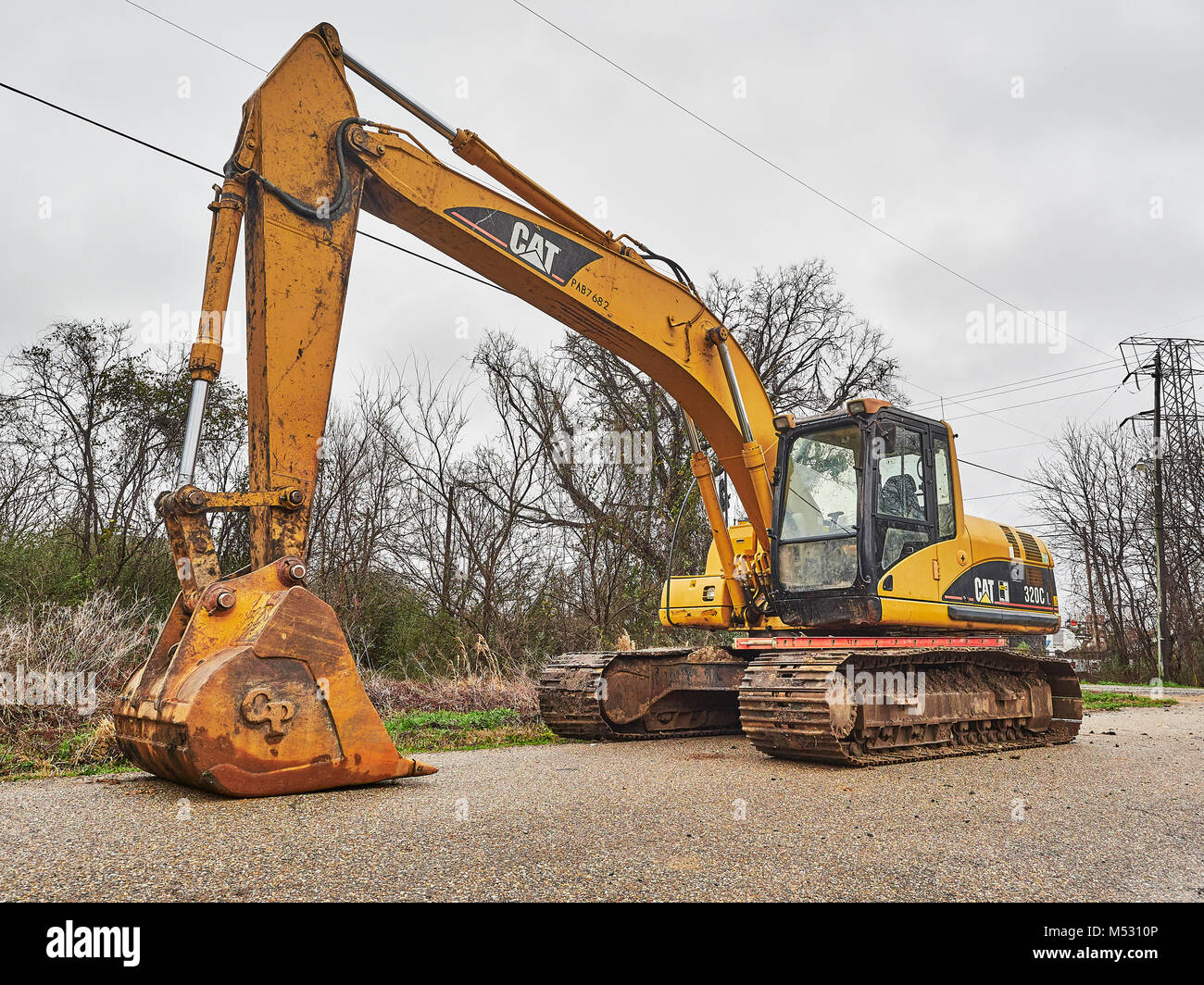 CAT 320C heavy duty digger, excavadora hidráulica, un gran pedazo de maquinaria de construcción sentado inactivo en Montgomery, Alabama, Estados Unidos. Foto de stock