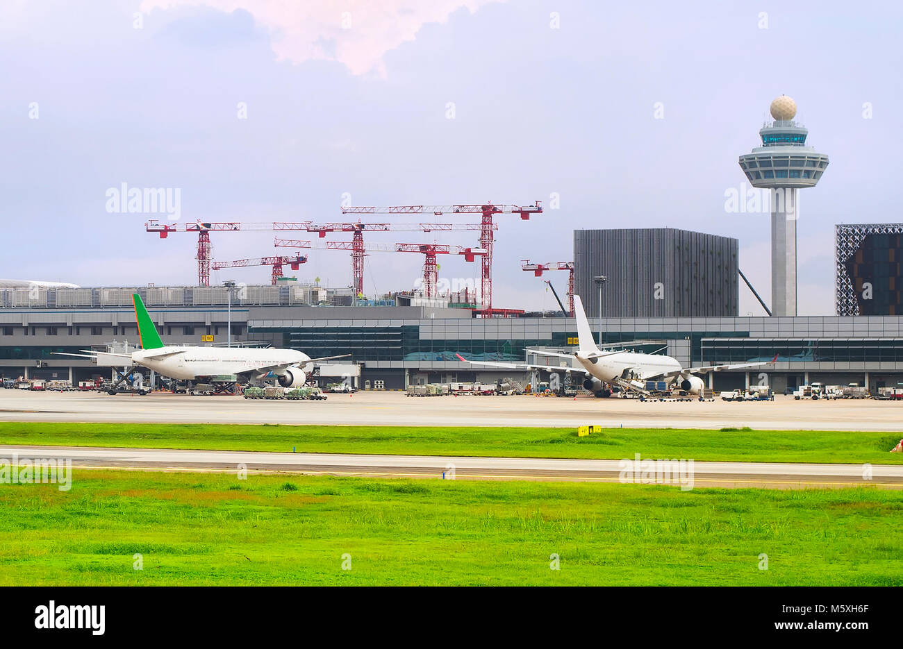 El Aeropuerto Internacional de Changi sitio en construcción. Singapur. Foto de stock