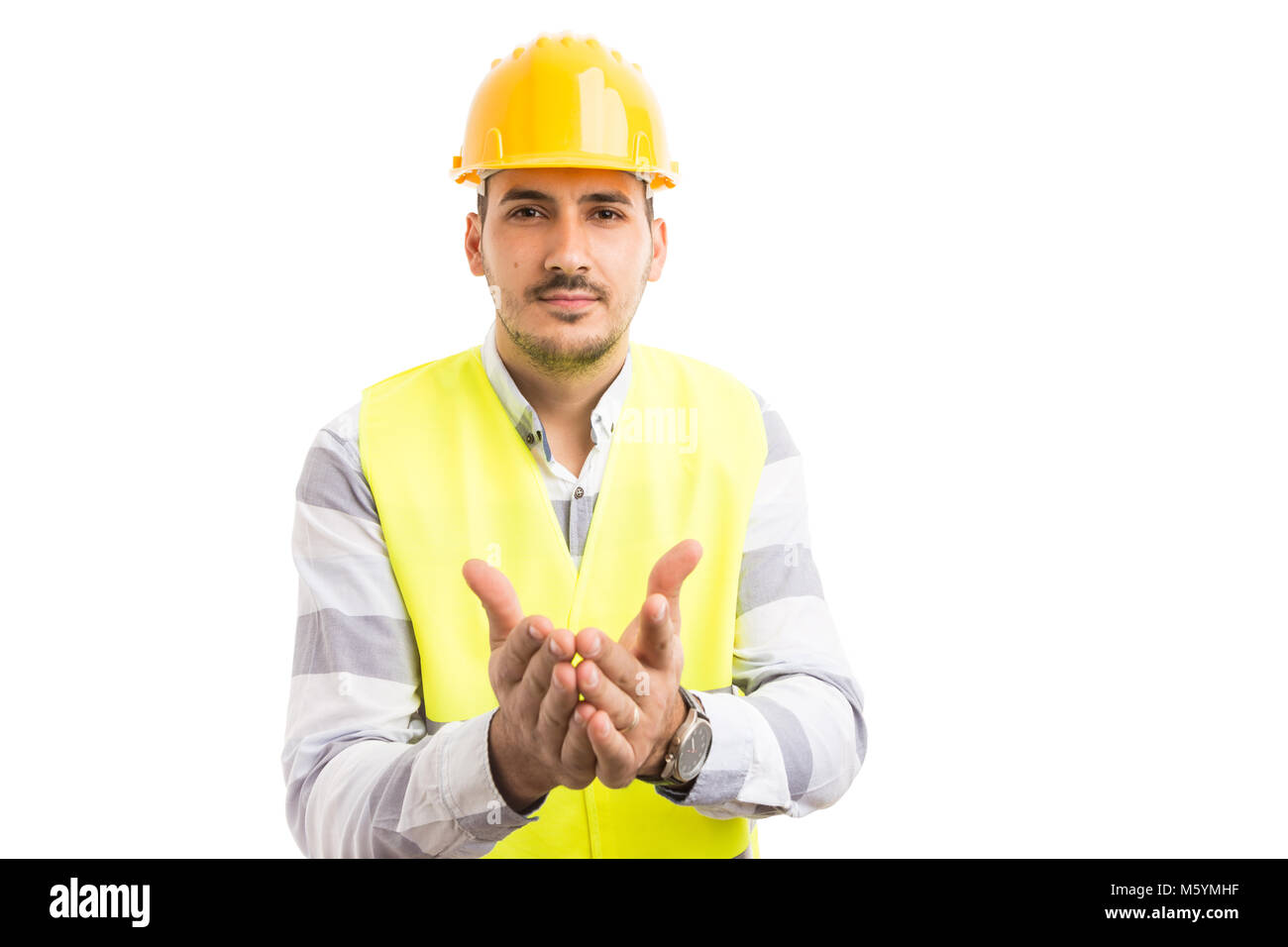 Ingeniero o trabajador de la construcción pidiendo limosna exigentes para obtener respuestas gesto aislado sobre fondo blanco. Foto de stock