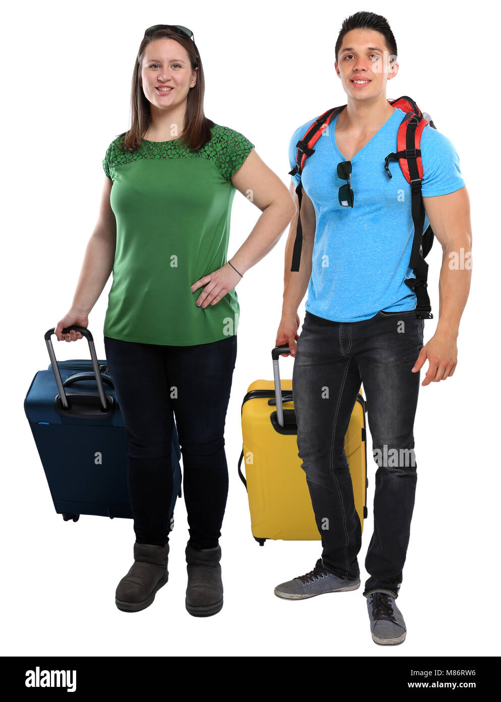 Las vacaciones a los jóvenes con el equipaje viaje viajar sonriente aislado sobre un fondo blanco. Foto de stock