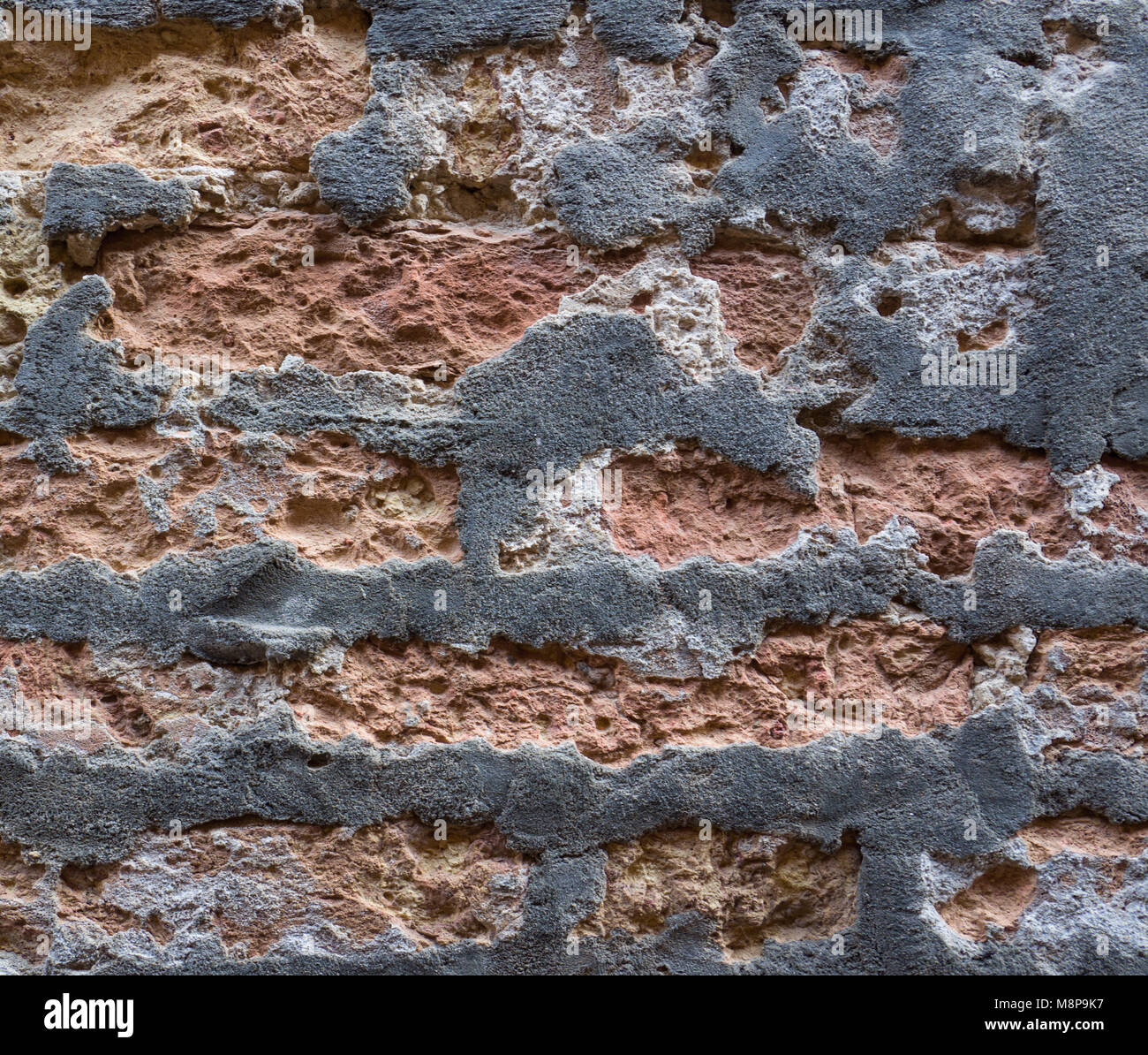 Pared de ladrillo rojo timeworn viejas Foto de stock