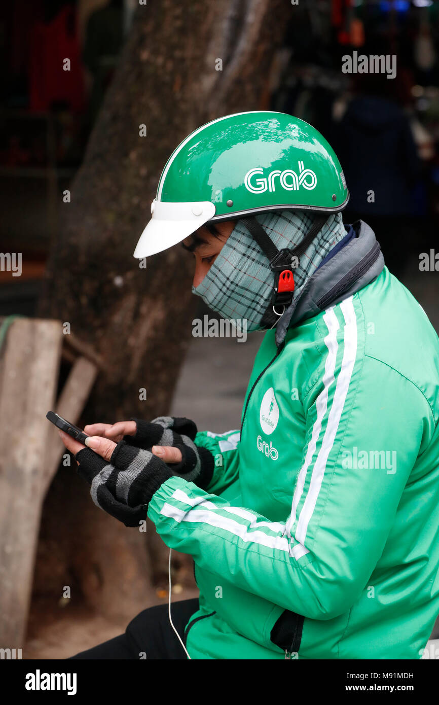 Moto grab conductor. Hanoi. Vietnam. Foto de stock