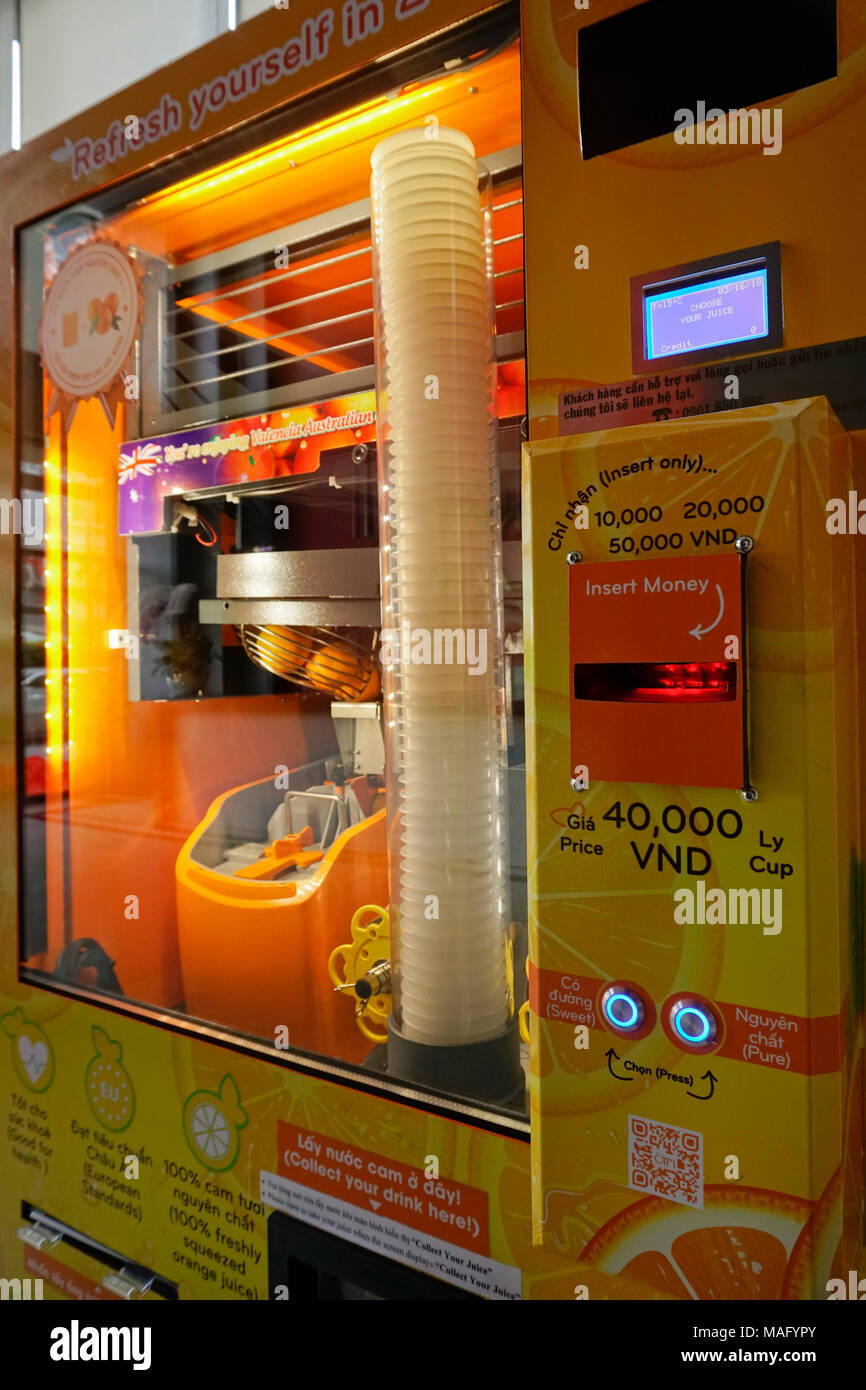 Máquina expendedora de jugo de naranja fresco, Vietnam Fotografía de stock  - Alamy