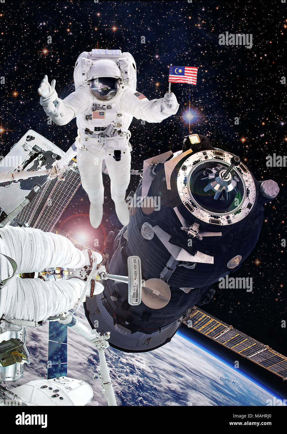 El astronauta en el espacio ultraterrestre, artista expresión de cosmonauta de la Agencia Espacial Nacional de Malasia en la Estación Espacial Internacional. Los elementos de esta imagen amueblar Foto de stock