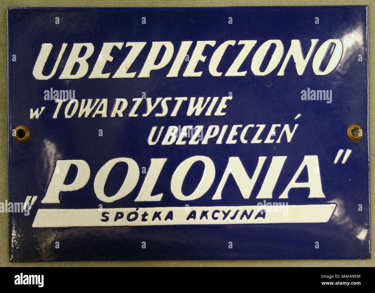 Esmalte de hierro firemark para Polonia en Varsovia, Polonia, mostrando el nombre de la empresa en blanco sobre fondo azul Título: Firemark para Polonia en Varsovia, Polonia. 1917. Foto de stock