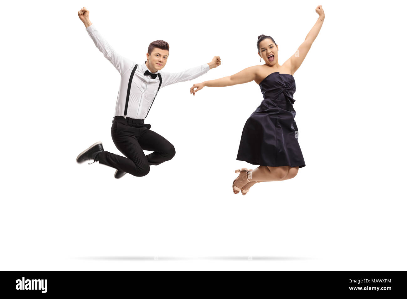 Ropa formal adolescentes saltando y gesticulando felicidad aislado sobre  fondo blanco Fotografía de stock - Alamy
