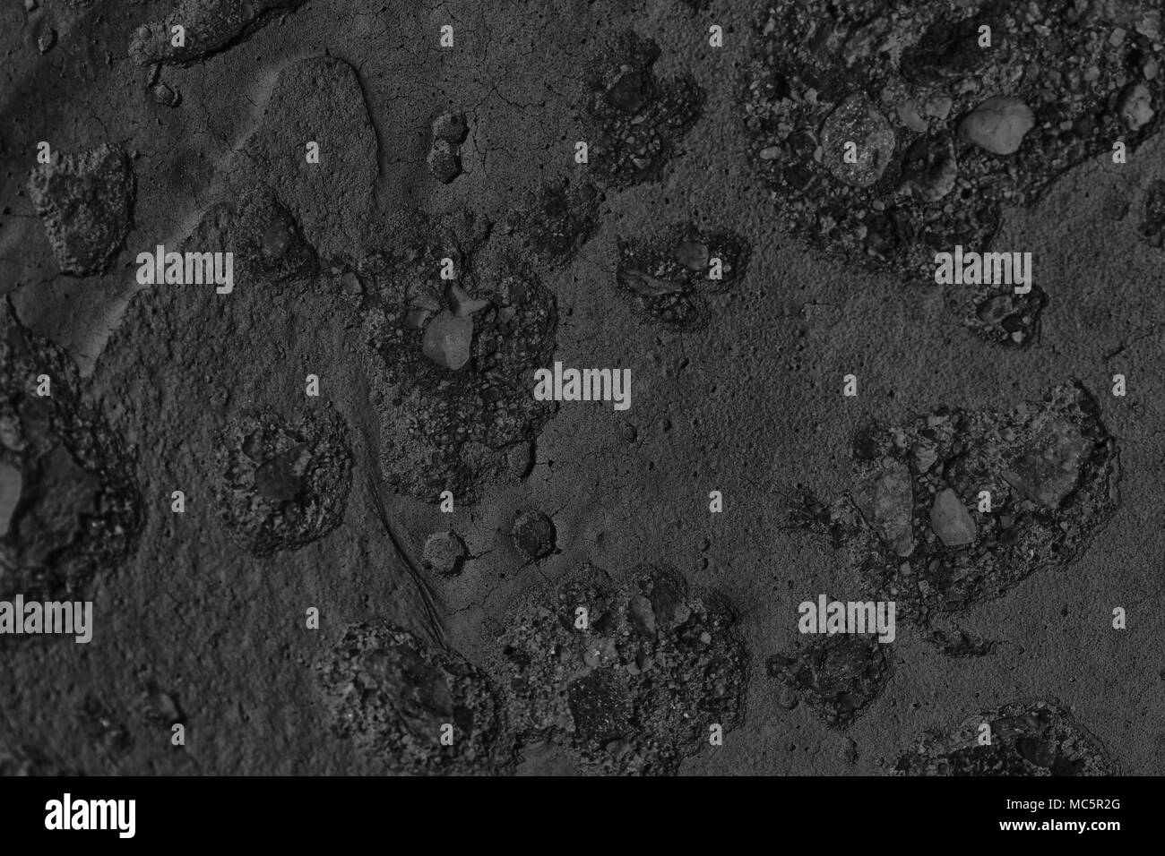 Marte monocromo textura de yeso en la pared, agrietado, fondo de la superficie de la piedra Foto de stock