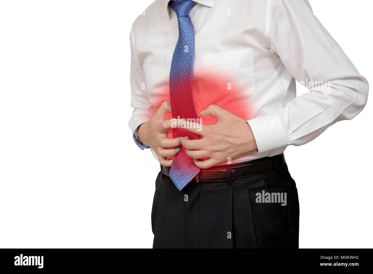 El empresario mantiene su estómago en dolor con dolor de estómago o la indigestión Foto de stock