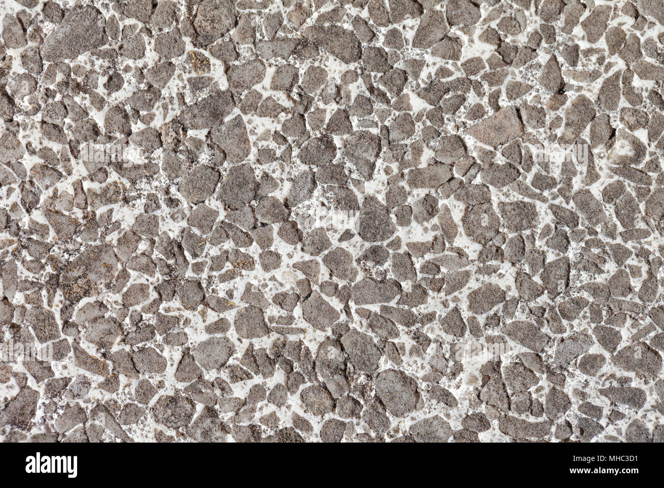 Piso Terrazzo textura deteriorado por el uso y el paso del tiempo