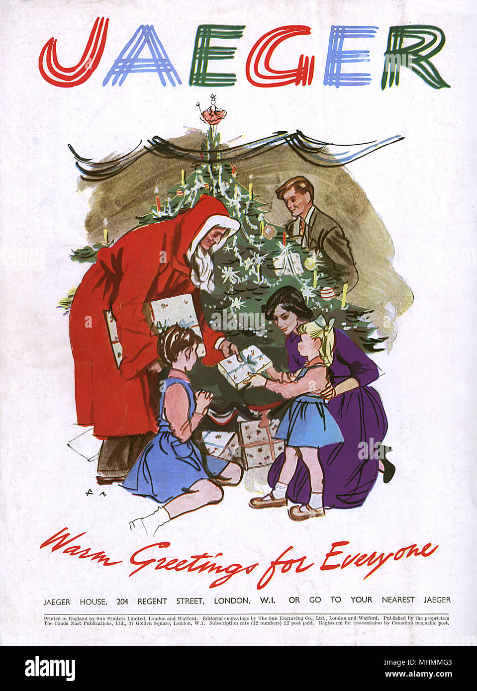 Anuncio de Jaeger, mostrando todos alrededor del árbol de Navidad. Fecha: 1948 Foto de stock