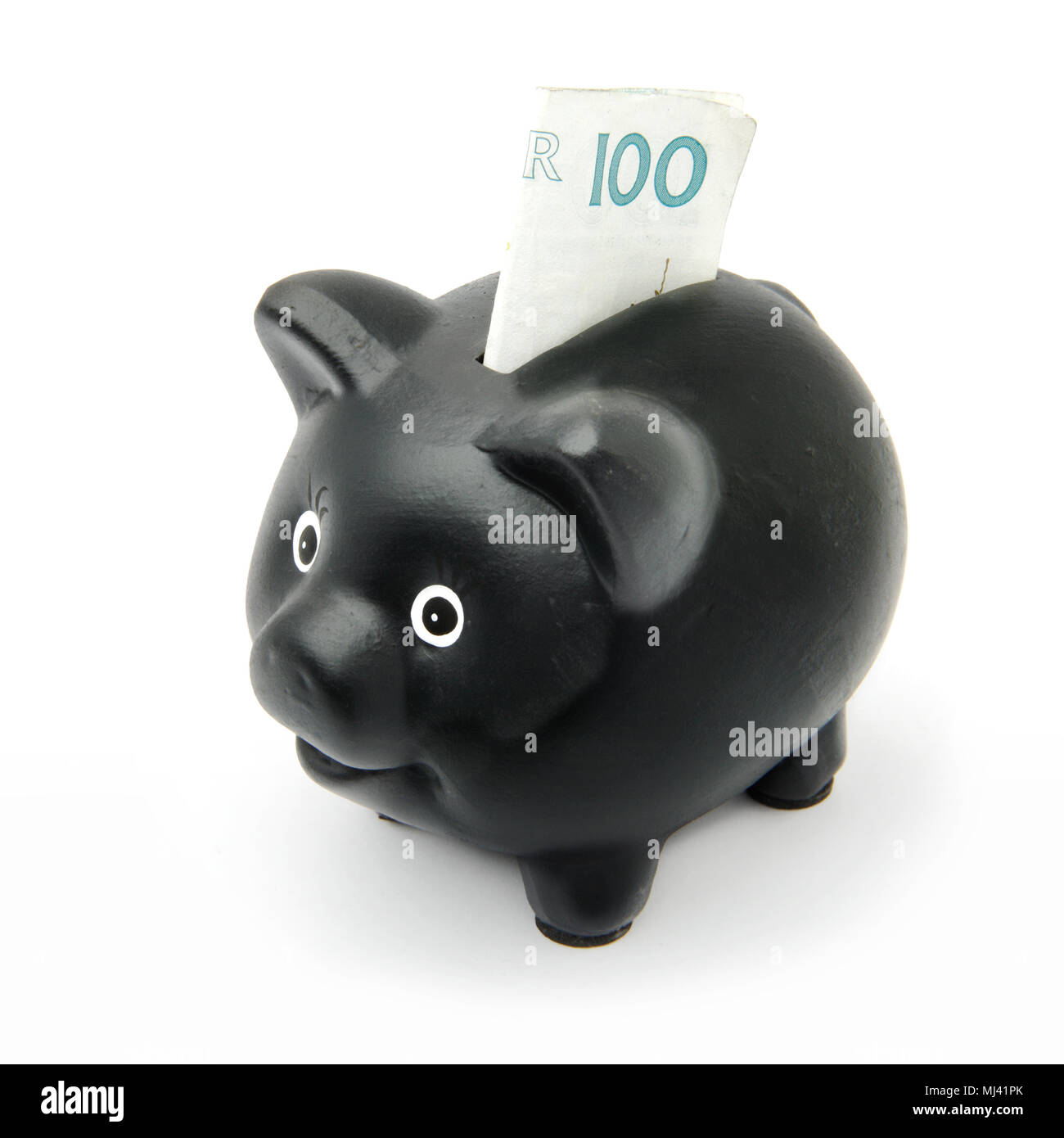 Hucha negro aislado en blanco con un insertado 100 Bank note. Foto de stock
