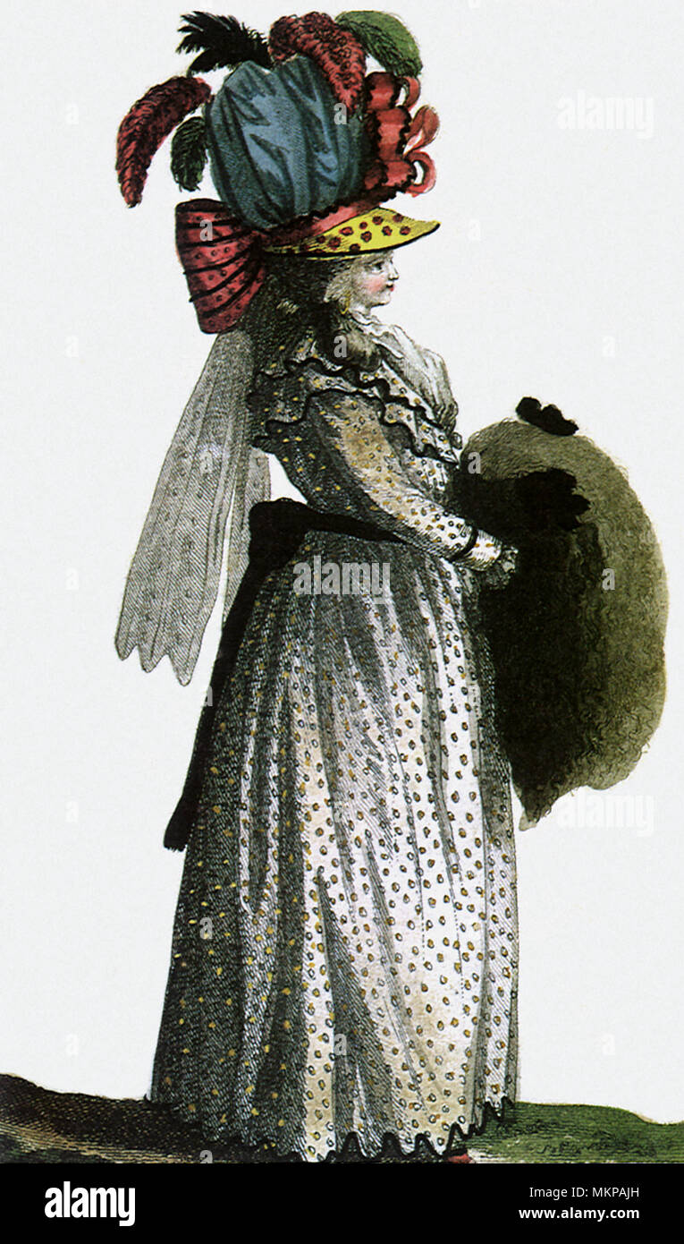 Mujer en vestido blanco y elaborar Hat Foto de stock