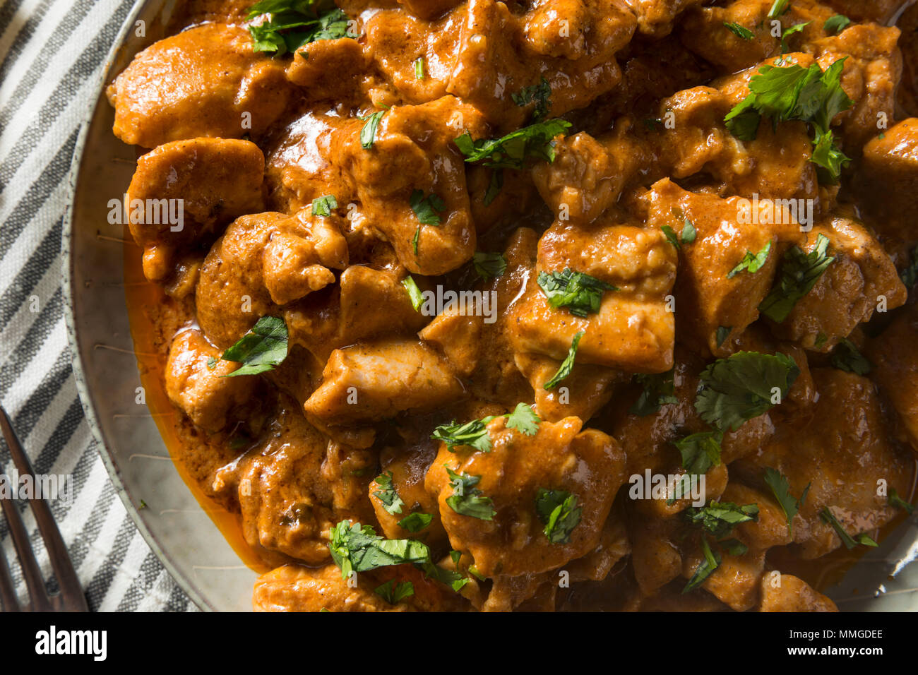 Indian mantequilla casera pollo con arroz y pan naan Foto de stock